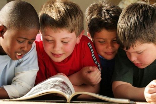students reading books together